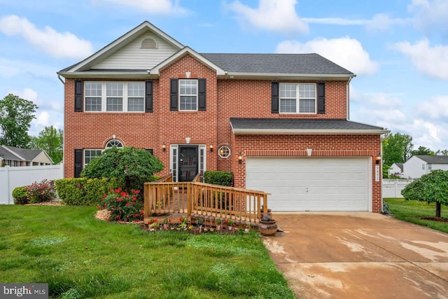 5971 Schooner Cir, King George, VA 22485 - view of front facade featuring a garage, concrete driveway, and brick siding