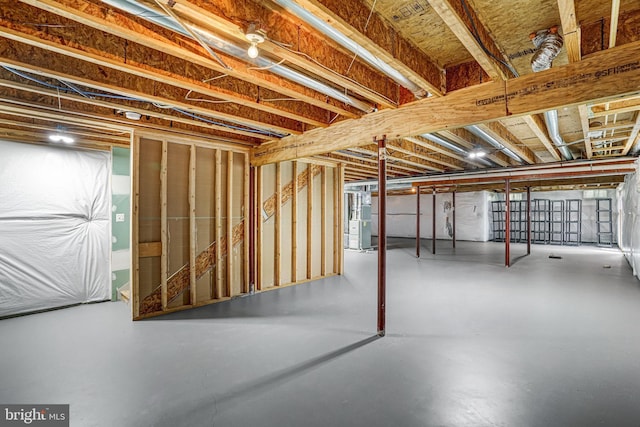 unfinished basement with heating unit