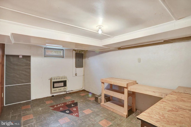 finished basement featuring heating unit and electric panel