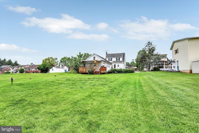 view of yard with a deck