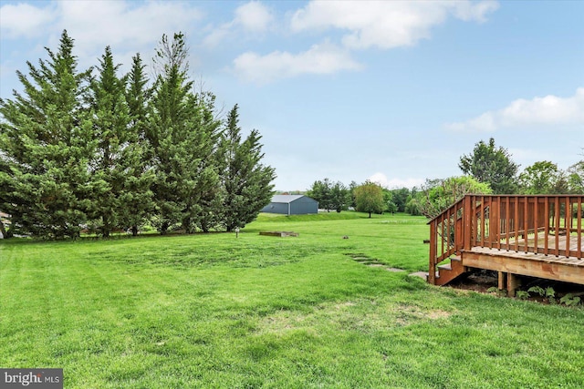 view of yard featuring a deck
