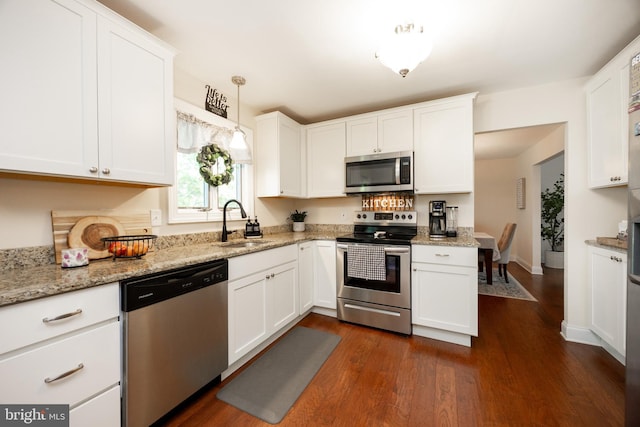 926 Pierce Rd, Norristown, PA 19403 - kitchen featuring appliances with stainless steel finishes, a sink, white cabinets, and dark wood finished floors