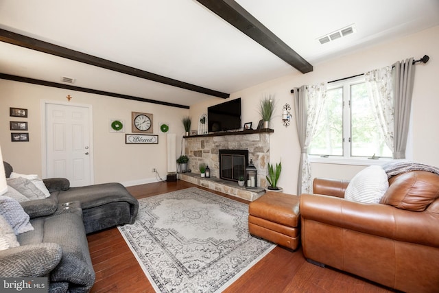 926 Pierce Rd, Norristown, PA 19403 - living area with beam ceiling, a fireplace, dark wood finished floors, and baseboards