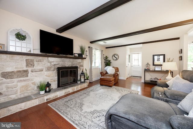 926 Pierce Rd, Norristown, PA 19403 - living room with beam ceiling, wood finished floors, a fireplace, and baseboards