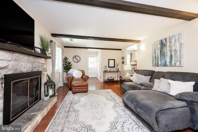 926 Pierce Rd, Norristown, PA 19403 - living room featuring beam ceiling, dark wood-style floors, and a fireplace