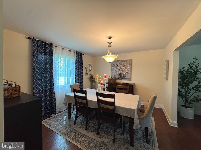 926 Pierce Rd, Norristown, PA 19403 - dining space with dark wood-style flooring and baseboards