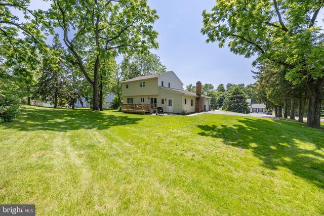 926 Pierce Rd, Norristown, PA 19403 - view of green lawn featuring a wooden deck