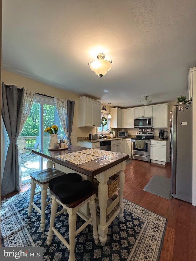 926 Pierce Rd, Norristown, PA 19403 - dining space with dark wood-style flooring