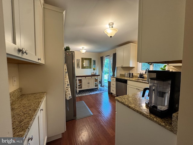 926 Pierce Rd, Norristown, PA 19403 - kitchen with appliances with stainless steel finishes, white cabinetry, dark wood-style flooring, and light stone countertops