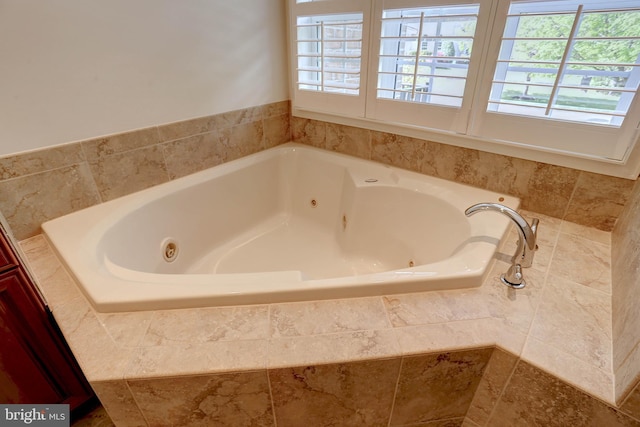 bathroom featuring a jetted tub