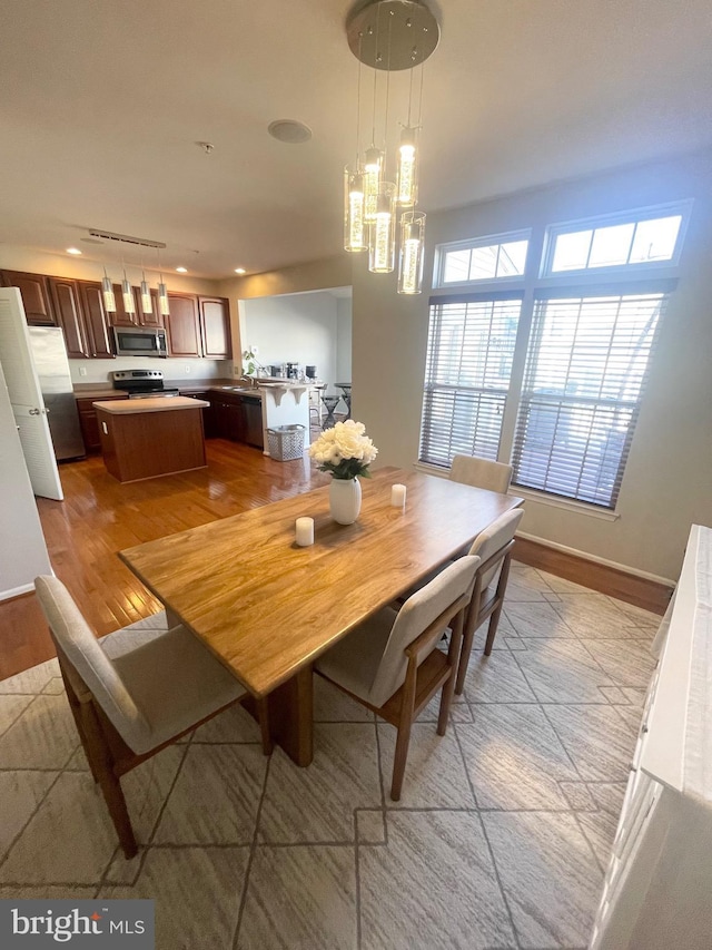 1716 Sunningdale Ln, Hanover, MD 21076 - dining space with light wood-type flooring, recessed lighting, and baseboards