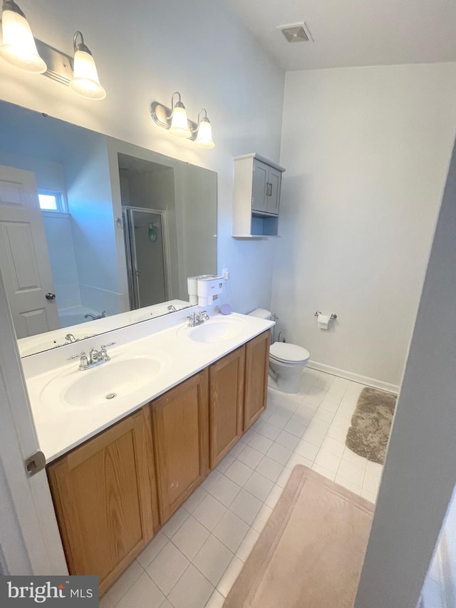 1716 Sunningdale Ln, Hanover, MD 21076 - bathroom featuring tile patterned floors, a stall shower, double vanity, a garden tub, and toilet