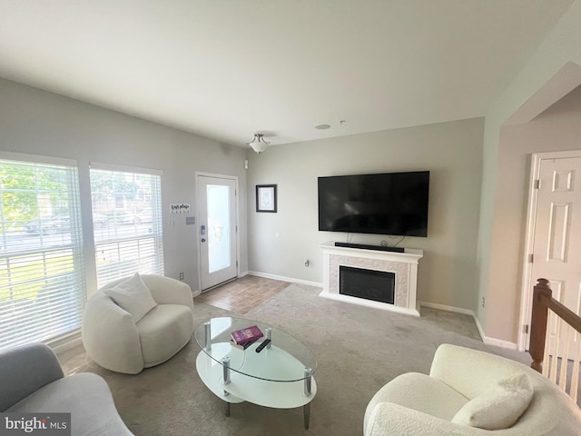 1716 Sunningdale Ln, Hanover, MD 21076 - living area featuring baseboards, light colored carpet, and a fireplace