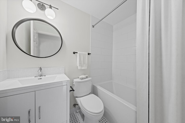 bathroom with toilet, vanity, shower / bathtub combination, and tile patterned floors