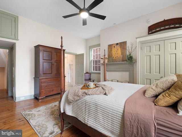 13 The Strand, New Castle, DE 19720 - bedroom featuring light wood-type flooring, baseboards, ceiling fan, and a closet