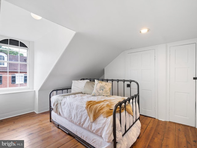 13 The Strand, New Castle, DE 19720 - bedroom featuring wood-type flooring, baseboards, recessed lighting, and vaulted ceiling
