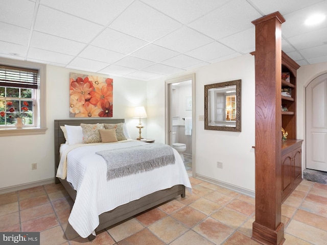 13 The Strand, New Castle, DE 19720 - bedroom featuring a drop ceiling, baseboards, and ensuite bathroom