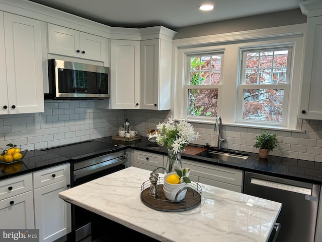36 W Summit St, Souderton, PA 18964 - kitchen featuring stainless steel microwave, dishwashing machine, a sink, white cabinets, and recessed lighting