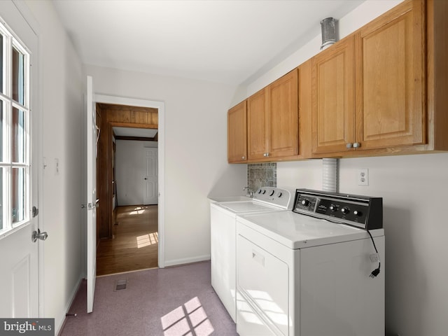 222 Springloch Rd, Silver Spring, MD 20904 - laundry area featuring washing machine and clothes dryer, cabinet space, light carpet, and baseboards