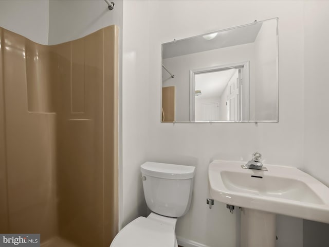 222 Springloch Rd, Silver Spring, MD 20904 - bathroom with a shower, toilet, and a sink