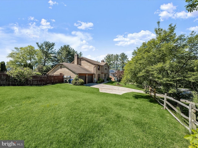 222 Springloch Rd, Silver Spring, MD 20904 - view of yard with a garage and driveway