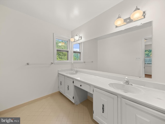 222 Springloch Rd, Silver Spring, MD 20904 - bathroom with double vanity, tile patterned flooring, and baseboards