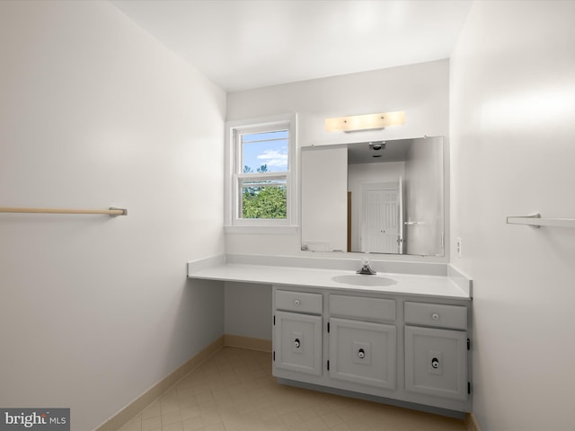 222 Springloch Rd, Silver Spring, MD 20904 - bathroom with vanity, baseboards, and tile patterned floors