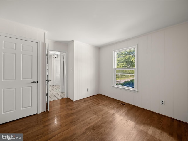 222 Springloch Rd, Silver Spring, MD 20904 - unfurnished bedroom with wood finished floors and crown molding
