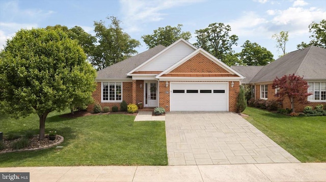 craftsman inspired home featuring driveway, a garage, brick siding, and a front yard