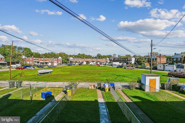 view of community featuring fence