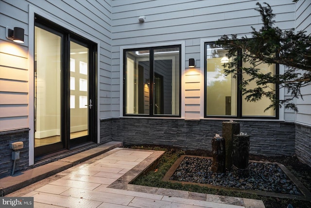 4012 N Upland St, Arlington, VA 22207 - entrance to property featuring stone siding and a surveillance system