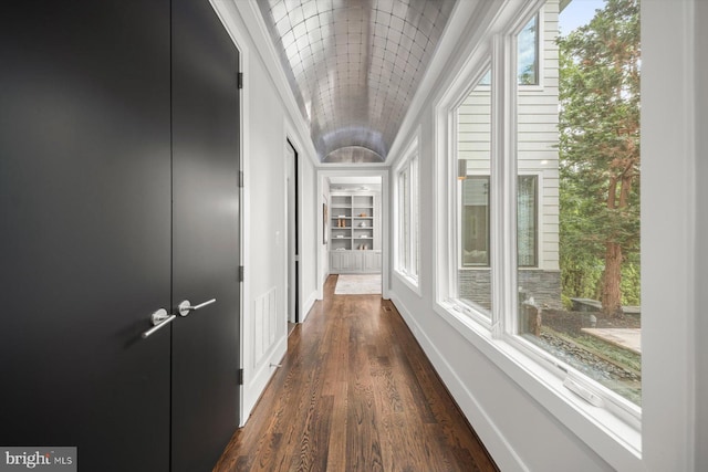 4012 N Upland St, Arlington, VA 22207 - hall featuring built in shelves, dark wood-style floors, baseboards, lofted ceiling, and ornamental molding