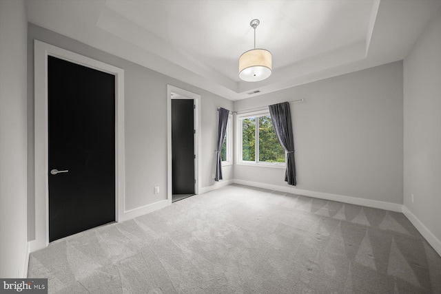 4012 N Upland St, Arlington, VA 22207 - unfurnished bedroom featuring a raised ceiling, carpet, and baseboards