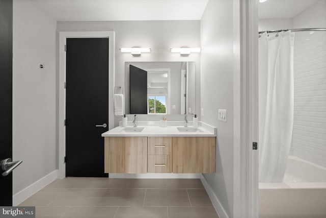4012 N Upland St, Arlington, VA 22207 - bathroom featuring double vanity, shower / tub combo with curtain, baseboards, and tile patterned floors