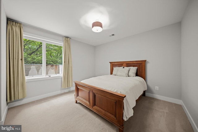 4012 N Upland St, Arlington, VA 22207 - bedroom with light carpet and baseboards