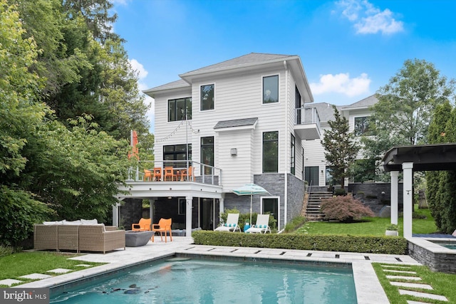4012 N Upland St, Arlington, VA 22207 - back of house with a balcony, outdoor lounge area, a patio, an outdoor pool, and stairs
