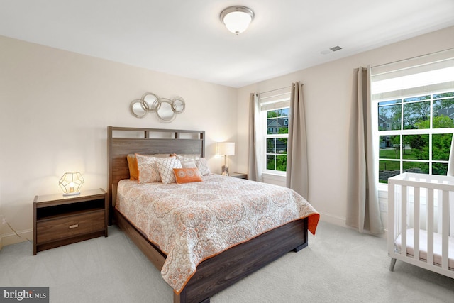 bedroom with carpet and baseboards