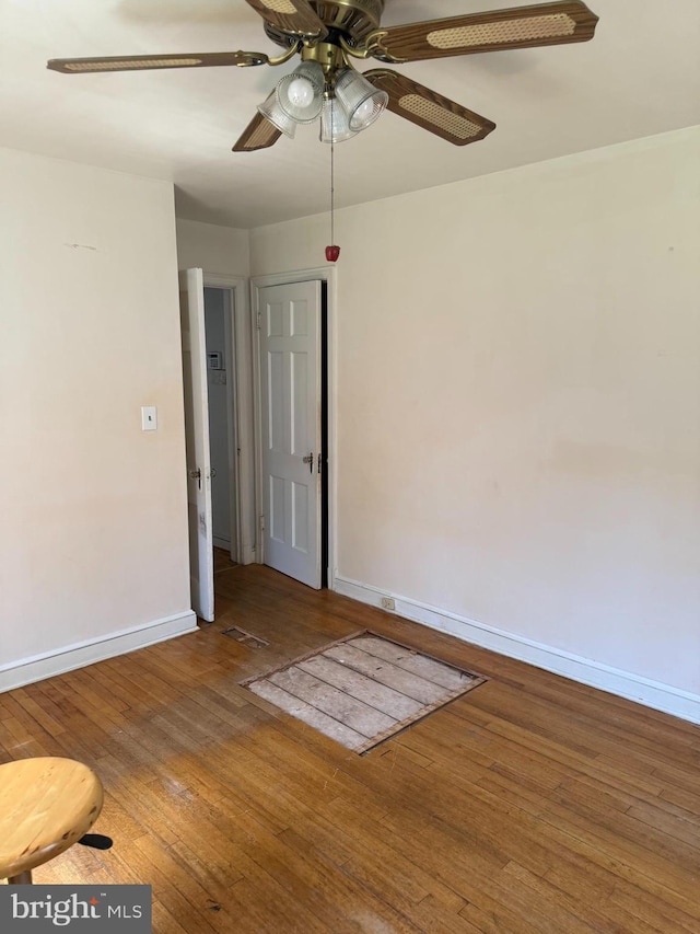 1127 45th Pl SE, Washington, DC 20019 - spare room with ceiling fan, baseboards, and wood-type flooring