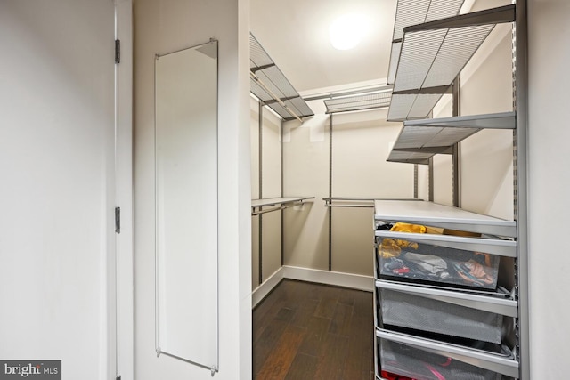 1700 Kalorama Rd NW Unit 207, Washington, DC 20009 - spacious closet featuring dark wood-type flooring