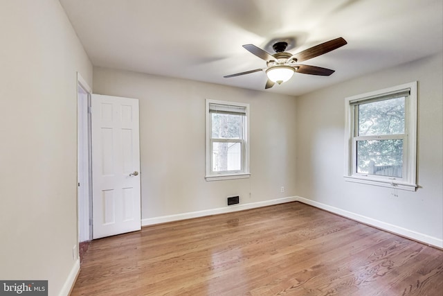 4611 Powder Mill Rd, Beltsville, MD 20705 - empty room with light wood finished floors, baseboards, and a ceiling fan