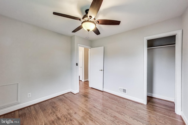 4611 Powder Mill Rd, Beltsville, MD 20705 - unfurnished bedroom with a ceiling fan, visible vents, wood finished floors, and baseboards