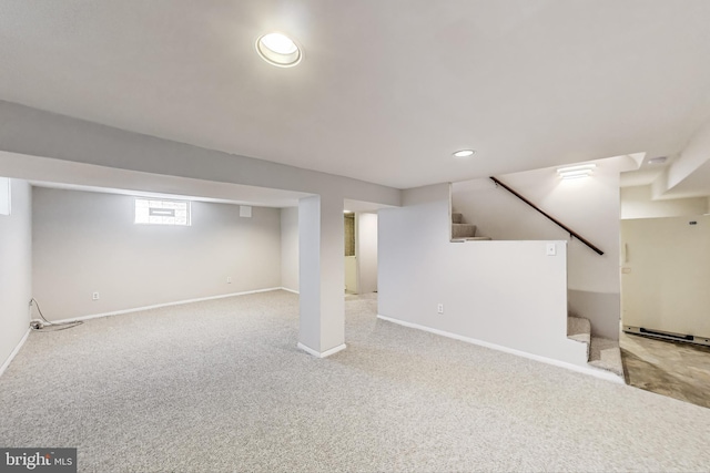 4611 Powder Mill Rd, Beltsville, MD 20705 - below grade area with white refrigerator, stairs, carpet floors, and baseboards