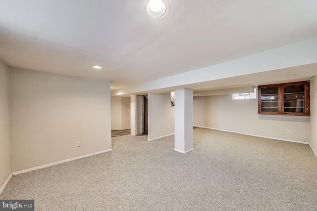 4611 Powder Mill Rd, Beltsville, MD 20705 - below grade area featuring light colored carpet and baseboards