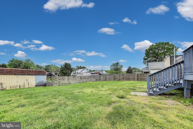 4611 Powder Mill Rd, Beltsville, MD 20705 - view of yard with a fenced backyard, an outdoor structure, and stairway