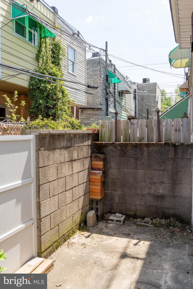 view of patio / terrace featuring fence