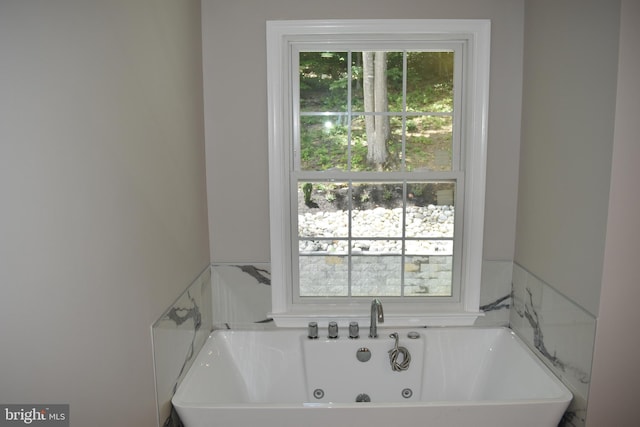 2008 Coast Guard Dr, Stafford, VA 22554 - bathroom featuring a soaking tub
