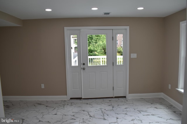 2008 Coast Guard Dr, Stafford, VA 22554 - foyer featuring recessed lighting, baseboards, and marble look tiles