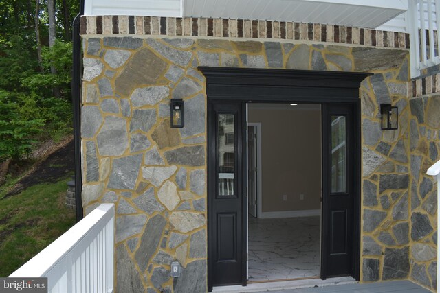 2008 Coast Guard Dr, Stafford, VA 22554 - doorway to property featuring stone siding