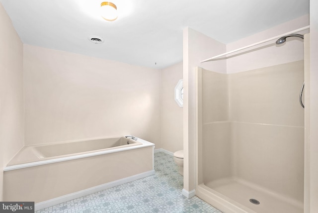 bathroom with a shower, baseboards, toilet, and a garden tub