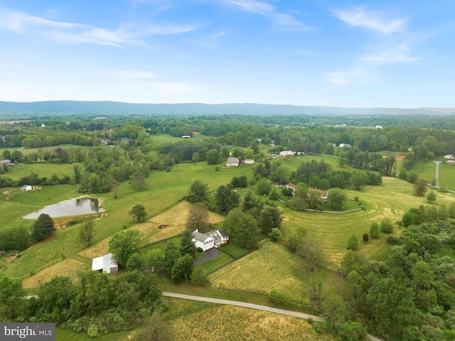 aerial view of property and surrounding area with rural landscape